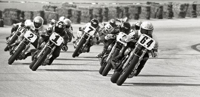 Mil Mile 2 Ricky Graham (64) leads the pack of Harley-Davidson 883 Sportster riders through a turn at the Milwaukee Mile in 1993. That Shawn Higbee in Graham’s draft. Local favorite Scott Zampach in on bike No. 1. (Larry Lawrence photo)