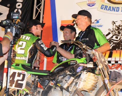 The three men mostly responsible for Kawasaki's first AMA Grand National Twins victory at the Indy Mile - rider Bryan Smith, R&D tester Jay Springsteen and builder Bill Werner, here pictured atop the Indy Mile podium. (Larry Lawrence photo)