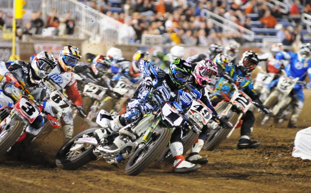 Springfield ST start Henry Wiles (1) leads the pack heading into the first turn at the start of Saturday’s Springfield Short Track. Wiles won both the race and the Grand National Singles title at the Illinois State Fairgrounds Multi-Purpose Arena. (Larry Lawrence photo)