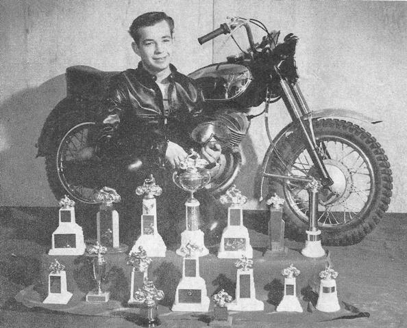 Glass, Tommy - 1956 Tommy Glass posing with his trophies and Zundapp race bike in 1956. Glass, of Flint, Michigan, was one of the region’s top Scrambles racers, winning dozens of regional events during the mid-1950s.
