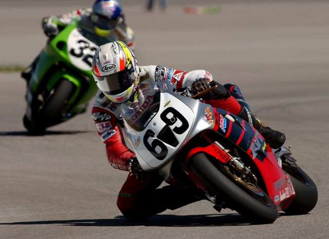 One from the Brian J. Nelson archives: Nicky Hayden leads Eric Bostrom in the 2001 AMA Superbike National at Pikes Peak Int’l. Raceway in Fountain, Colo. Hayden rode a factory Honda RC51 en route to his third-straight win in the Superbike series. At that point in the season he was third in the standings behind Australian Mat Mladin and Bostrom with two rounds remaining. The championship ultimately ended in that order. (Brian J. Nelson photo)