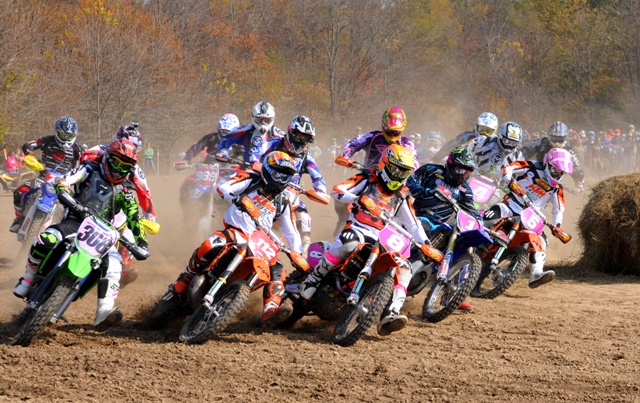 Ironman start Cory Buttrick (8) gets the holeshot at the start of the Ironman GNCC, but it was Paul Whibley (1), who came through to take the victory. Also in the photo are Justin Williamson (308), Russell Bobbitt (112) and Kailub Russell (5). (Larry Lawrence photo)