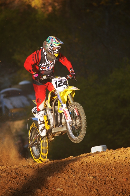 The late afternoon sun casts a warm glow on Colby McCutcheon and his Suzuki hillclimber at the AMA Pro Hillclimb Championship final in Oregonia, Ohio, on Oct. 10, 2010. McCutcheon won the meet and the Unlimited class crown. (Larry Lawrence photo)