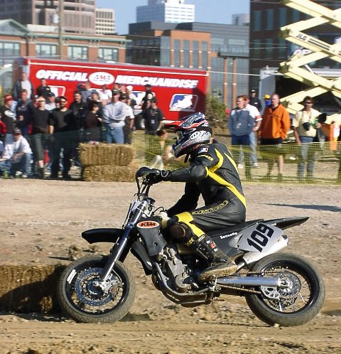 Sansotta, Stan - Columbus SuMo '03 Unlimited Class rider Stan Sansotta races his KTM in the flat track section of the Columbus (Ohio) AMA Supermoto Championship round in October of 2003. (Larry Lawrence photo)