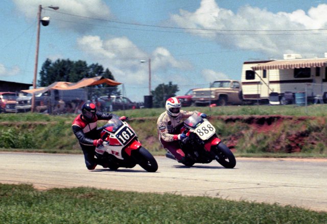 Smith, Adam - Hunt, Kevin - Road Atlanta - WERA - Aug 85 - sm Adam Smith (161) and Kevin Hunt (888), both on Yamaha FZ750s, battle diving together into turn one in a WERA Regional event at Road Atlanta in August of 1985. Smith went on that year to win a slew of WERA Novice national titles later that year. Hunt is best known for going on to form the KWS Motorsports team that fielded successful teams in AMA Superbike racing. (Larry Lawrence photo)