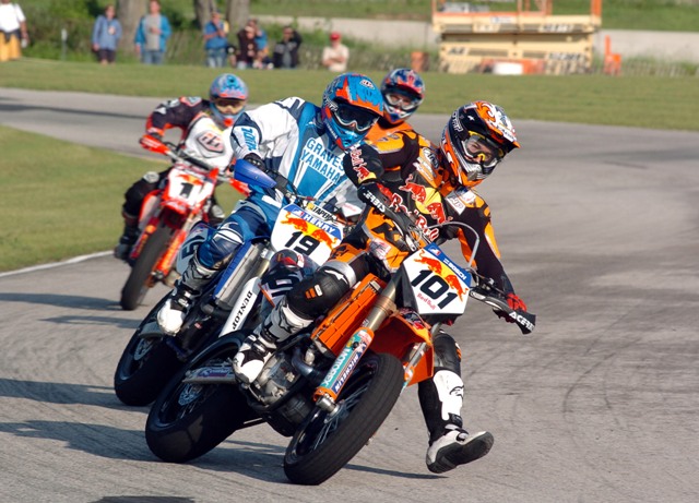 Thierry van den Bosch, of France, leads Doug Henry, Jurgen Kunzel and Jeff Ward on the final lap of the AMA Supermoto Championship race at the Briggs & Stratton Motorplex in Elkhart Lake, Wis. Henry made a dramatic pass to edge van den Bosch in the second race. The Frenchman van den Bosch won the first race. (Larry Lawrence photo)