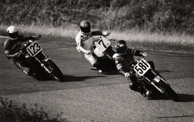 Morin, George (4)-sm George Morin (Kawasaki # 581) leads “Crazy Frank” Mrazek (Kawasaki # 7) and pre-race favorite Rueben McMurter (Kawasaki # 123) through Edmonton’s famous banked “bowl” turn in a Canadian Superbike Championship round in June of 1980. (George Morin collection)