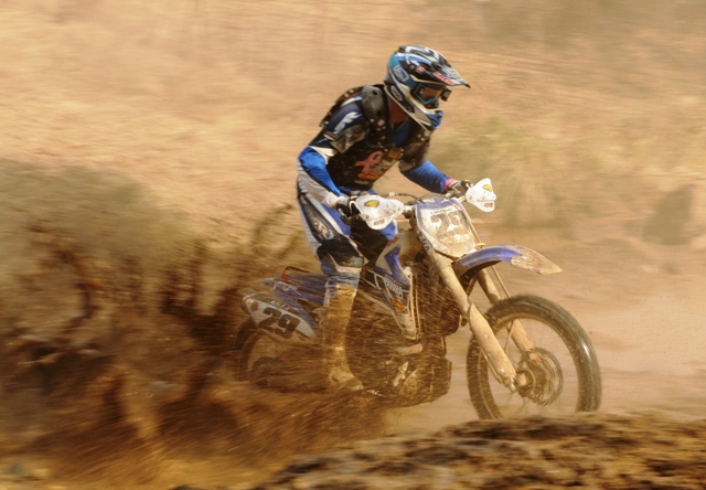 Stewart, AJ - 2010 Ironman GNCC AJ Stewart, of Lake Lynn, Pa., negotiates a small creek crossing in one of the few places where there was actually water at the drought stricken Ironman Grand National Cross Country race last month in Crawfordsville, Indiana. (Larry Lawrence photo)