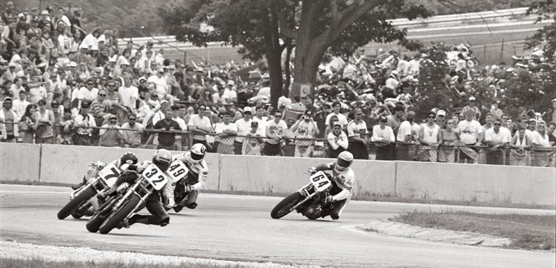 Mike Hale (No. 32) leads Richard Koehler (No. 7), Jay Springsteen (No. 49) and Ricky Graham (No. 64) during the Harley-Davidson 883 Road Race before a massive crowd at Road America in Elkhart Lake, Wisconsin, on June 13, 1993. It marked perhaps the biggest crowd ever to attend a motorcycle race at Road America, since it was Harley-Davidson’s 90th anniversary celebration and visiting Road America to watch the 883s was part of the weekend’s programs. (Larry Lawrence photo)