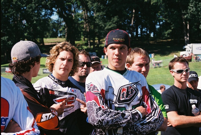James Rispoli (with the long, curly hair) hams it up for the photographer at the Peoria TT. Rispoli is standing between rivals J.D. Beach (facing away from camera) and Brad Baker (with the Troy Lee Designs jersey). At the races Rispoli is often the life of the paddock. James says if you can’t have fun racing why do it? (Larry Lawrence photo)