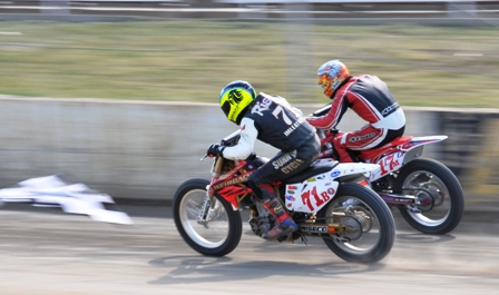 This is how close James Rispoli and Brad Baker were in race after race in AMA Pro Singles flat track racing. This a Heat race from Rapid City, South Dakota in 2009. (Larry Lawrence photo)