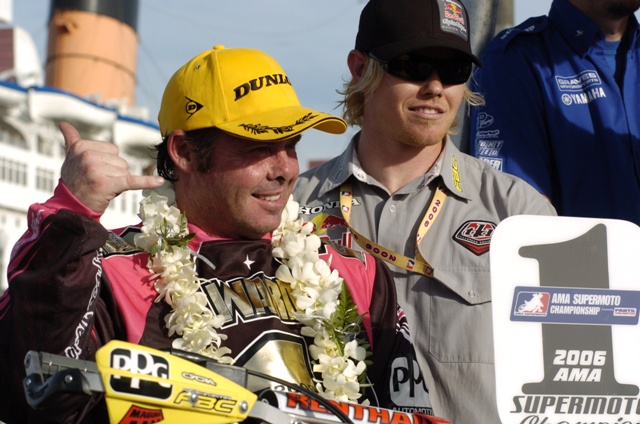 Jeff Ward, of Newport Beach, Calif., holds up his No. 1 plate after clinching the AMA Supermoto Championship at the Queen Mary Docks in Long Beach, Calif., on Sunday, Nov. 5, 2006. It marked the second AMA Supermoto Championship for Ward. (Larry Lawrence photo)