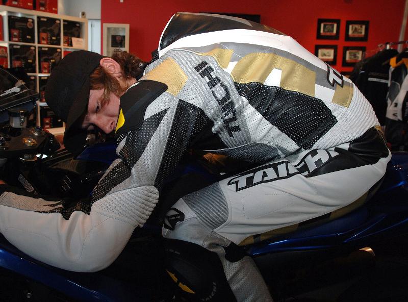 Eslick Taichi 2 Danny Eslick gets gucked in during a fitting for his new RS Taichi Racing suits.
