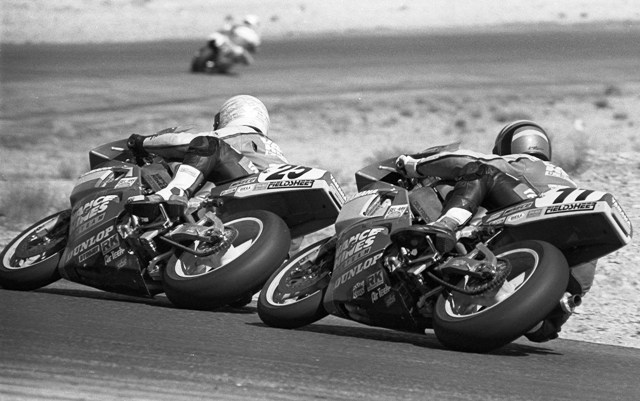 Sadowski - Stevens - Willow FUSA 1990 Willow Springs Formula USA race in April of 1990. David Sadowski (leading) was fresh off winning the Daytona 200, but now was in an epic duel with his Vance & Hines teammate Thomas Stevens. Coming up to turn eight for the last time the two were side by side. Stevens went in faster than he ever had before - it was the moment of truth. "He went in there so hot that I knew he was going to force me to do something I didn't want to do," Sadowski said. What “Ski” didn't want to do was to push that hard through the turn, but he wanted badly to beat his teammate, so push he did. The result was that both riders lost their front ends, the front wheels of both bikes sliding toward the outside of the turn. Stevens' slide was the most extreme. Blue smoke billowed from Stevens' front tire. "I felt the front end go, and at 130 mph there is not much you can do but hold on and hope it catches and doesn't throw you off. That was one of those situations where nine out of 10 times you crash," Stevens said. "I hope they caught that on the television cameras. That had to be one of the best double saves of all time," said Sadowski about the turn eight incident. Sadowski recovered from his near crash first, closed up on Stevens and drafted by him just before the checkered flag to take second, 4.6-seconds behind winner Scott Gray on a Carry Andrew-built Yoshimura Suzuki F-USA special. (Larry Lawrence photo)