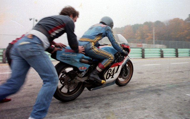 Canale, Wayne - WERA Endurance Elkhart '84 Wayne Canale, of Naperville, Illinois, getting pushed out of the pits after making a stop during a WERA six or eight hour national endurance race at Elkhart Lake, Wis., in 1984. Canale and his team raced a Yamaha TZ750 in the endurance event. The big TZ was a most unusual choice for an endurance racer that’s for sure. (Larry Lawrence photo)