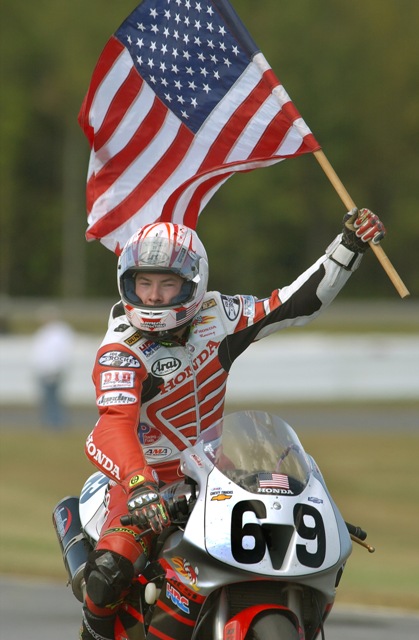 Hayden, Nick - VIR 2001 - Brian J Nicky Hayden takes a victory lap after winning the final race of the 2001 AMA Superbike Championships at Virginia International Raceway in Alton, Va. It marked the fourth win of the season for Hayden, who finished the championships ranked third. (Brian J. Nelson photo)