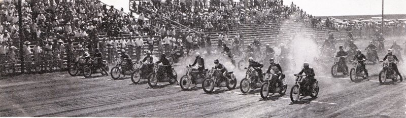 Dodge City - 1953 Front row riders at the start of the ill-fated 1953 Dodge City 200 are Chuck Basney (27), Paul Goldsmith (3), Hugh McAfee (89), Eugene Thiessen (4), Roy Dearing (33), Everett Brashear (25), Billy Huber (7), John Gibson (22), Al Gunter (54) and Burt Raush (62). On the second row you can see Claude Dawson (15), Gene Smith (96) and Billy McConnell (65).
