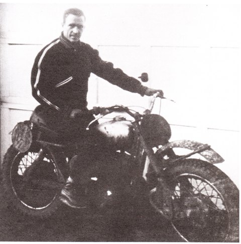 Dick Mann poses with his muddy Greeves after taking second overall to winner Don Shacker in the AMA District 36 Rough Scrambles Championship held in Placerville, Calif., in November of 1963.