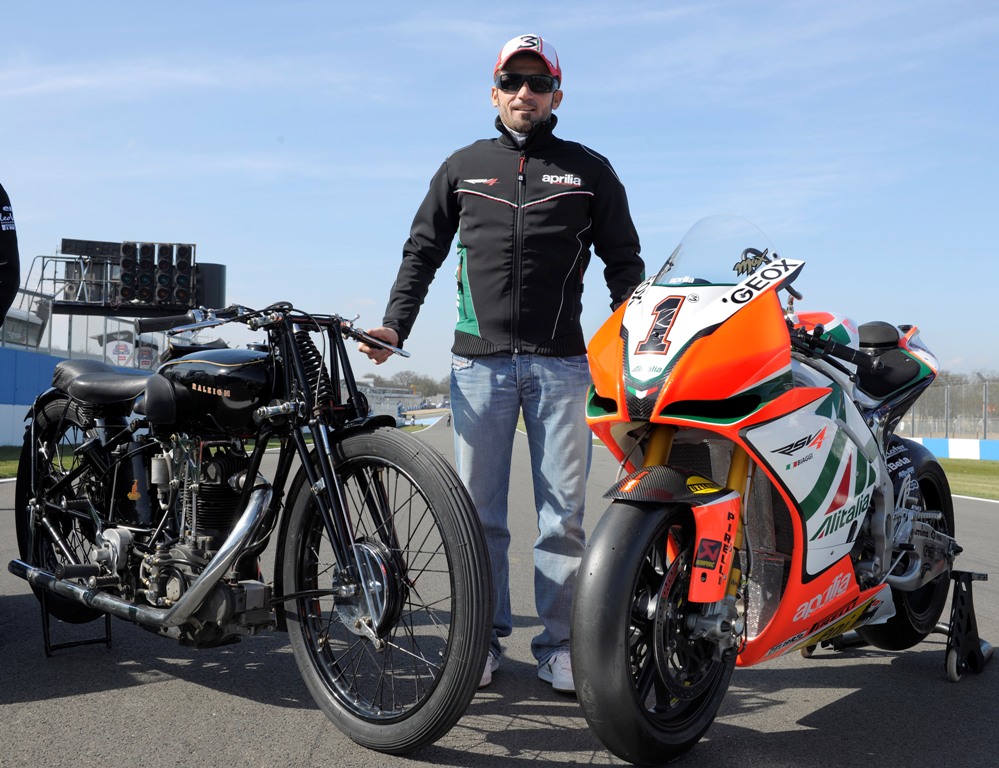 Max Biaggi stands between a classic racer and a modern Superbike.