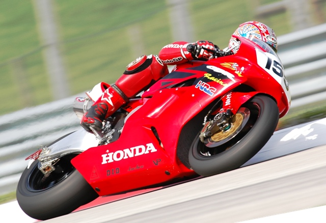 Bostrom, Ben - Mid-O '04 Ben Bostrom’s factory Honda CBR1000RR looked almost as fast as it really was with its striking red pant scheme. This photo was taking at Mid-Ohio in 2004. That weekend B-Boz took fourth and second in the pair of Mid-Ohio Superbike races. (Larry Lawrence photo)