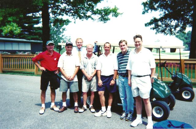 Bubba Shobert, who was an honorary Grand Marshal for the 1999 Indy Mile, riders Will Davis, Chris Carr and Scotty Parker with members of the Indianapolis media at a media day golf outing at the Brickyard Crossing. (Larry Lawrence photo)