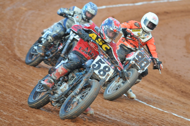 Carpinello - Bedford HM 2008 Adam Carpinello (No. 58B) leads Joe Hartrich (No. 90) and Dustin Crow (89P) on the gumbo of the Bedford (Pa.) Half-Mile in AMA Grand National qualifying in June of 2008. (Larry Lawrence photo)