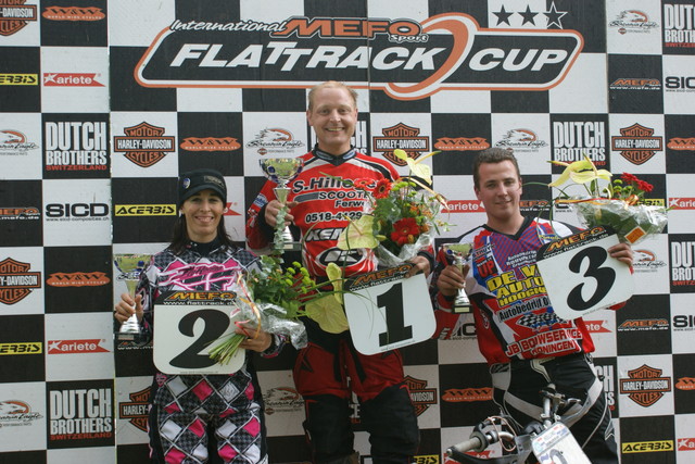 Intl. Mefo Flattrack Cup podium Second-place finishers Michelle Disalvo (left) shares the podium with Dutch riders Sytze Hilleger (winner) and third-place Johan Berndt at the International Mefo Sport Flattrack Cup.
