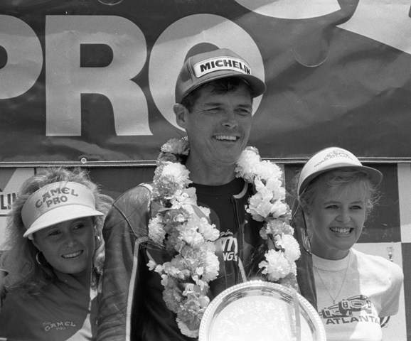 John Long looks happy after winning the 1988 AMA Pro Twins National at Road Atlanta in Braselton, Georgia. Long beat out Dale Quarterley and Jimmy Adamo to win the race. Quarterley went on to win the championship that season. (Larry Lawrence photo)