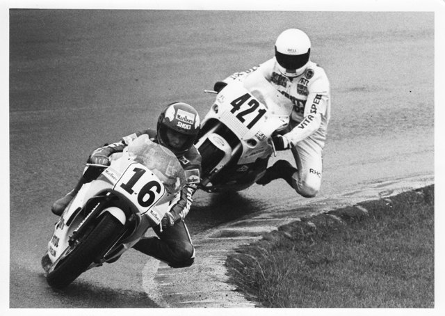 Robbie Petersen (No. 16) and Fritz Kling battle on a wet Grattan Raceway during round five of the 1990 WERA Formula USA National Series. The wet conditions gave Petersen and his Marlboro/Roberts Yamaha a fighting chance against the powerful Yoshimura-built Superbike ridden by Kling. (Larry Lawrence photo)