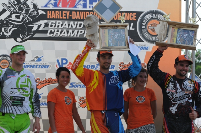 TT podium Jake Johnson celebrates his Springfield TT victory. Joining him on the podium are third-place finisher JR Schnabel (left) and Jared Mees (right), who was runner up. (Larry Lawrence photo)