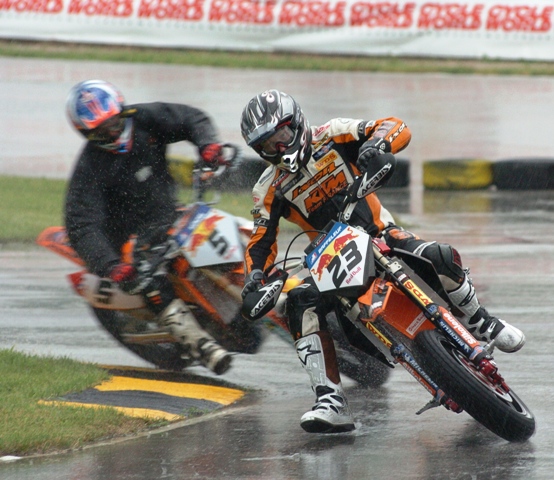 Baffeleuf - Road America SuMo '05 David Baffeleuf leads fellow KTM rider Jurgen Kunzel on Road America's Briggs & Stratton Motorplex in an AMA Supermoto race in June of 2005. The race was held in probably the hardest rain ever at an AMA Supermoto race. (Larry Lawrence photo)