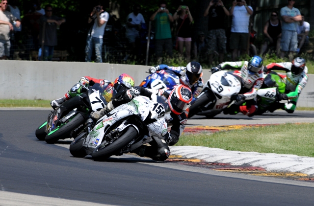 Hall, Matt - Elkhart '11 Matt Hall leads Matthew Sadowski (77), Michael Morgan (11), Barrett Long (29) and Brian Hall (66) in AMA Pro Daytona SportBike action at Road America on Sunday. There was some great racing in the middle of the 26-bike field, including this group. I don’t know if the Halls are related. Matt is from Kansas City, Missouri, while Brian is from Twin Lakes, Wisconsin. (Larry Lawrence photo)