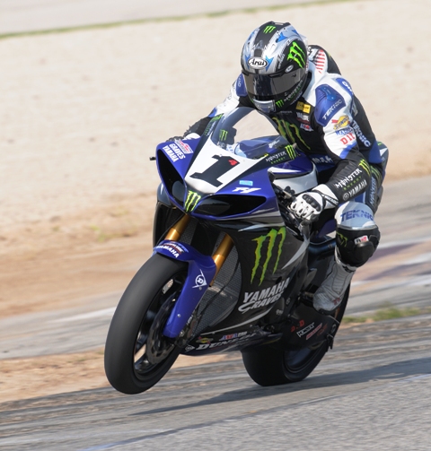 Hayes - Elkhart Friday Josh Hayes wheelies his Monster Energy Yamaha out of turn five en route to turning the fastest time by nearly a half-second in Friday’s first Superbike qualifying session at Road America. (Larry Lawrence photo)