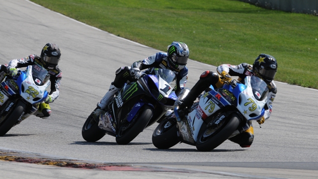 Blake Young, Josh Hayes and Tommy Hayden dive into turn five at Road America during the Road America Superbike race. The trio was this close the entire race. In the end Young scored the victory, his second straight. (Larry Lawrence photo)