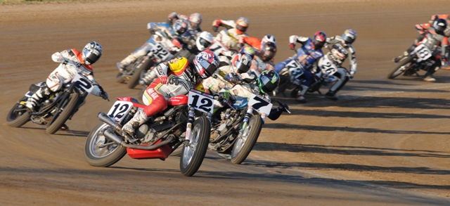 Baker - I-96 Brad Baker leading Sammy Halbert (7), Kenny Coolbeth (2) and the rest of the pack en route to a Heat race win at I-96 Speedway yesterday in Lake Odessa, Michigan. (Larry Lawrence photo)
