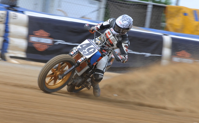 Cose, Chad - Lima '11 Chad Cose powers his Waters Auto Body Racing Suzuki through the cushion during practice for the Lima Half-Mile. Cose riding form through the turn is a thing of beauty. He’s on the gas, broadsliding the Suzuki with the front wheel just barely skimming the racing surface. (Larry Lawrence photo)