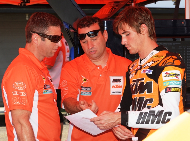 KTM crew Chris Fillmore talks with his HMC/KTM crew about the settings on the team's KTM RC8R Superbike.