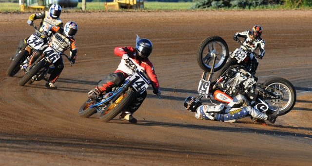 Murray-sm Steve Murray finds himself sliding down the track with his Harley Davidson of Salina/T&R Racing Harley-Davidson XR750 completely upside down between turns three and four at I-96 Speedway. (Larry Lawrence photo)
