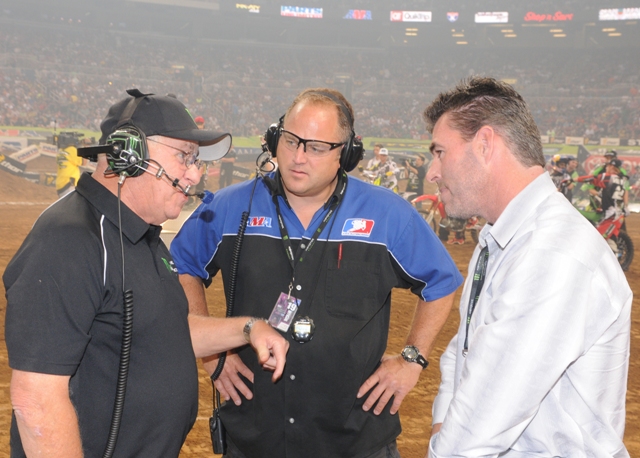 St. Louis SX '11 - Safreed, Bailey, Edmonds Former St. Louis Cardinals all-star Jim Edmonds and the AMA’s Chad Bailey listen to Feld Motor Sports floor manager Joe Safreed before the start of the St. Louis Supercross this past April. Edmonds was the ceremonial Grand Marshal for the event. (Larry Lawrence photo)