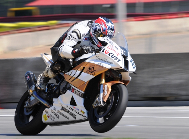 Trounson, Chris Australian racer Chris Trounson powers out of the final turn on the gorgeous San Diego BMW S1000RR at Mid-Ohio during Sunday’s American Pro Superbike final. Trounson is well into his comeback trail after crashing and being injured earlier this season and is quickly moving up the ladder as he learns the American circuits. (Larry Lawrence photo)