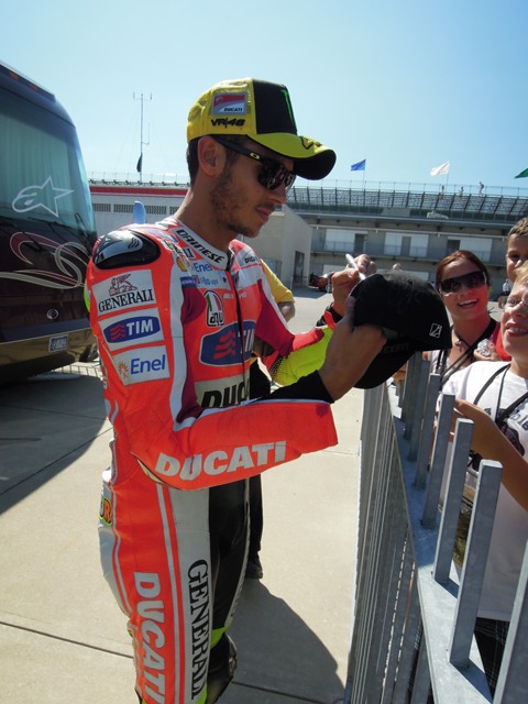 In spite of having an off season, Rossi is still by far the most popular MotoGP rider and has a constant throng of fans following his every move in hopes of getting a coveted autograph. (Larry Lawrence photo)