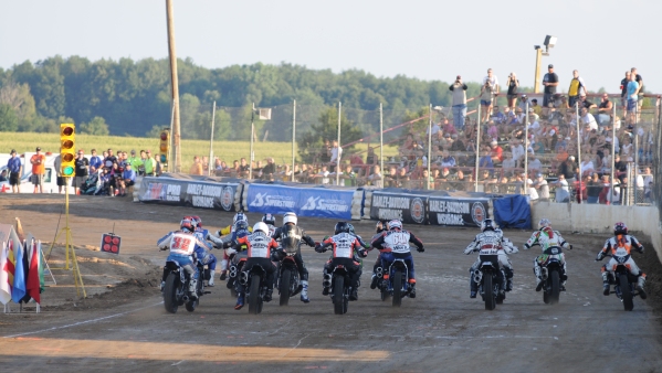 I-96 Green Light In the shadow of the grandstands, AMA Grand National riders get the green light for a Heat race at I-96 Speedway in Lake Odessa, Michigan. (Larry Lawrence photo)