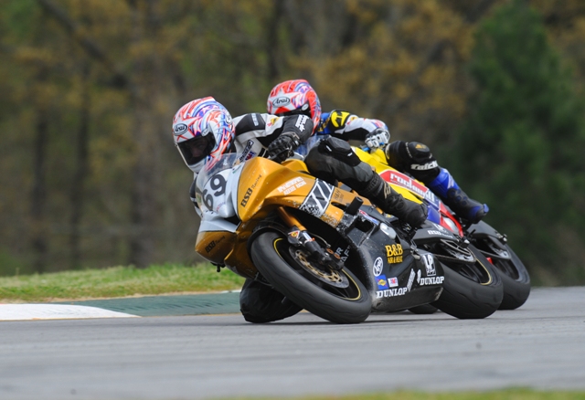 Floridian Kyle Keesee (No. 69 Kawasaki Ninja ZX-6R) races Texan Lloyd Worrell in the AMA Pro SuperSport at Road Atlanta in April of 2009. Keesee eventually won out in this mid-pack battle over Worrell. (Larry Lawrence photo)