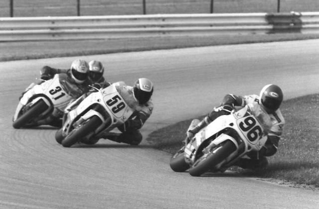 Martin - IRP 001 Michael Martin leads his Valvoline Suzuki teammate Donald Jacks (no. 59), Fritz Kling (No. 31) and Chris D’Aluisio (partially hidden behind Kling) in a WERA Pro Formula USA race in the early 1990s. (Larry Lawrence photo)