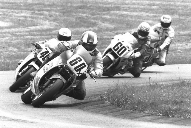 Pummell - Mich GP Phil Pummell leads a Michigan Grand Prix race at Grattan Raceway on his Honda VFR750 Superbike. He’s followed by Randy Gaddey, on what I think was a Suzuki GSXR1100, Kurt Hall, on a Dave Zupan-tuned Human Race Team Yamaha FZR1000 and Marty Miller on another Suzuki. (Larry Lawrence photo)
