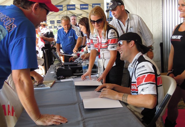 Spies signs Ben Spies signs copies of his new bio book “Taking It to the Next Level” Friday at the Indianapolis Motor Speedway. (Larry Lawrence photo)