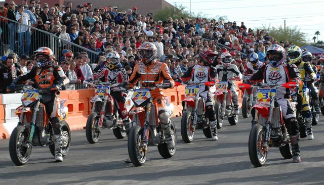 DSC_0051_028 Kurt Nicoll (No. 31), David Baffeleuf (No. 23) and Jeff Ward (No. 3X) line up on the front row for the 2004 AMA Supermoto championship finale in Las Vegas. Also visible in the photo are Mike Metzger (No. 875), Chris Fillmore (No. 11) and Alexandre Thiebault (No. 47). Ward won the race and the championship. (Larry Lawrence photo)