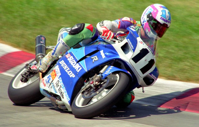 Stevens, Thomas - Mid-Ohio '93 Thomas Stevens racing a Yoshimura Suzuki GSXR750 Superbike at Mid-Ohio Sports Car Course in 1993. Three years at Yoshimura produced only a single podium for Stevens, but what a memorable podium it was. In the 1995 Daytona 200 Stevens passed then new World Superbike rider Colin Edwards on the last lap to secure the spot. That ride was one of Stevens’ proudest moments he later said. (Larry Lawrence photo)