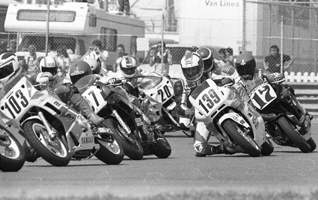 Daytona 600SS - 1989 Daytona Supersport action in 1989 showing Michigan’s Gus Christensen (103) leading Virginian Todd Hoge (No. 57), Canadian Paul MacMillan (No. 139), Pennsylvania’s Doug Tosten (No. 17) and Northern California ace David Deveau (No. 20). There are at least five other riders in the photo that you can’t see their numbers illustrating just how close Supersport racing of the era was. Deveau was the top finisher in this group. (Larry Lawrence photo)