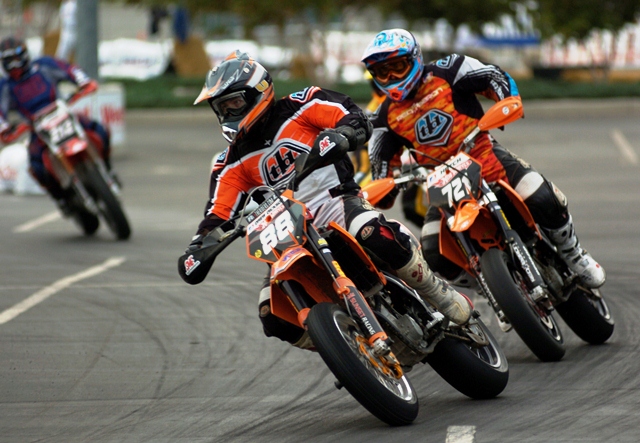 Dickson - Denver SuMo Lites '06 AMA Hot Wheels Supermoto Lites riders Drew Dickson (No. 88) and Steve Hatch (No. 721) battle going into a turn at the Denver AMA Supermoto event in August of 2006. (Larry Lawrence photo)